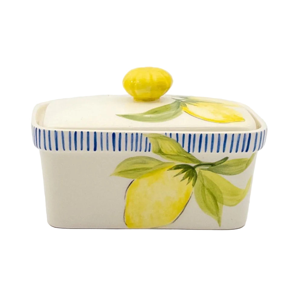 Decorative ceramic butter dish with lemon design on a white background