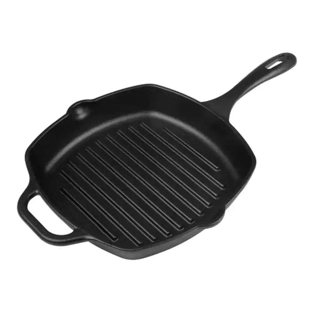 Black cast iron grill pan on a white background