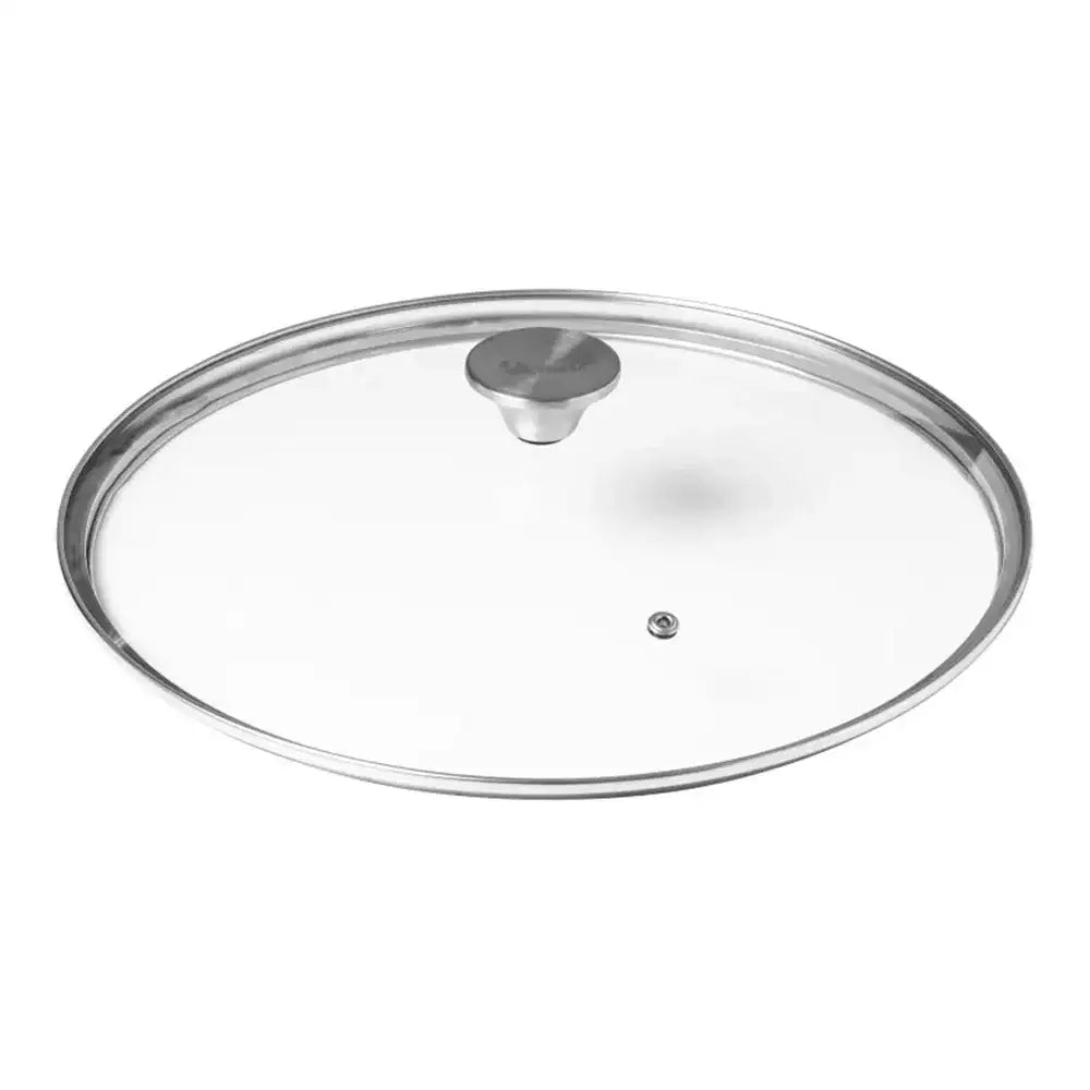 Clear glass lid with metal rim on a white background