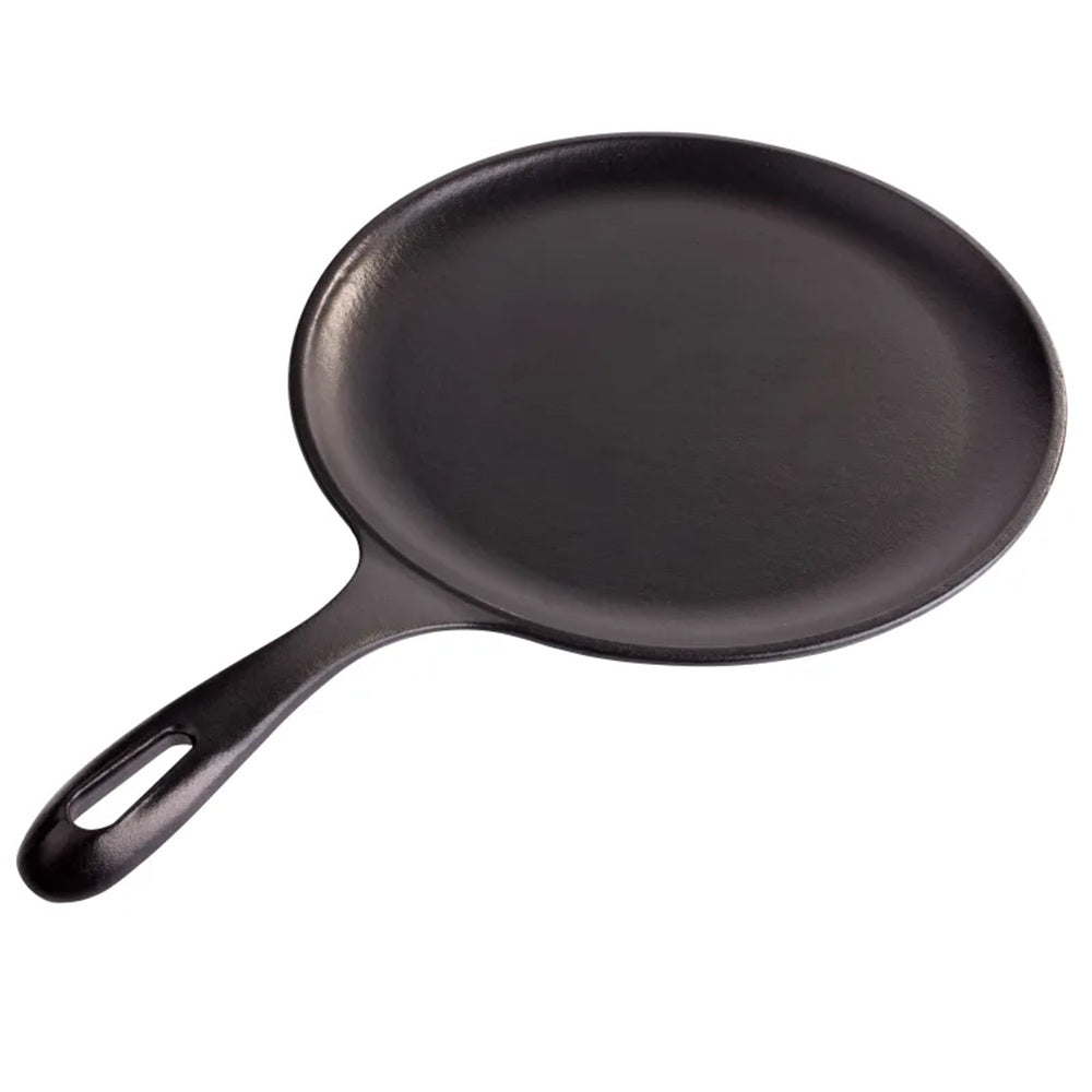 Black cast iron skillet on a white background