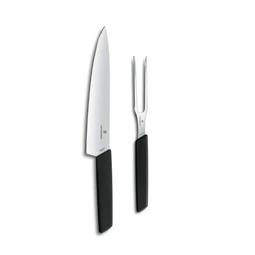 Knife and fork with black handles on a white background