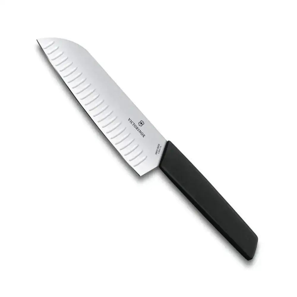 Victorinox knife with black handle on a white background