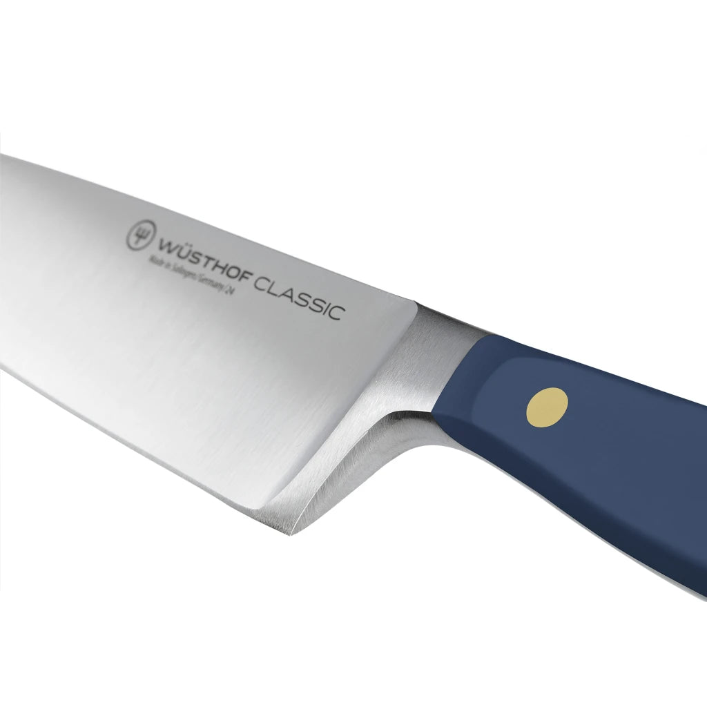 Wüsthof Classic knife with a blue handle on a white background
