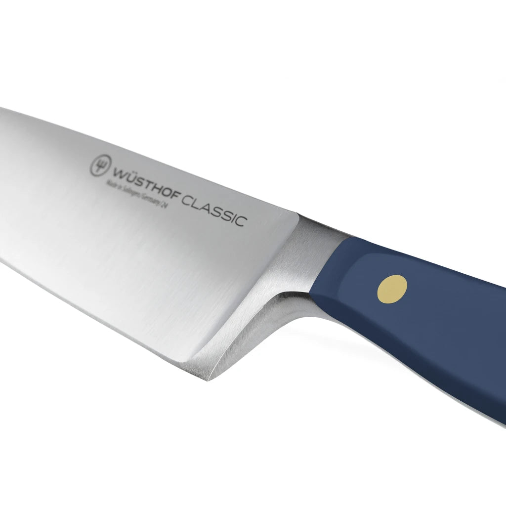 Wüsthof Classic knife with a blue handle on a white background