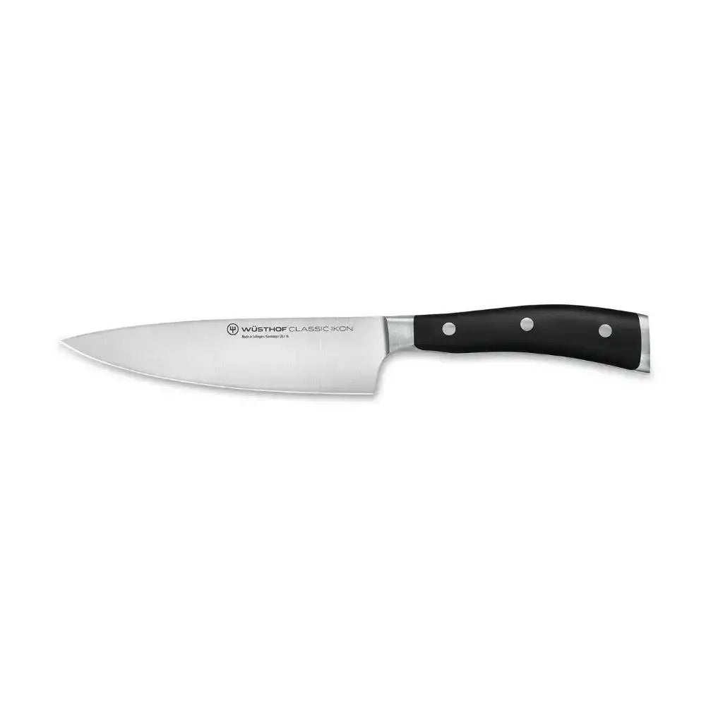 Knife with a black handle on a white background