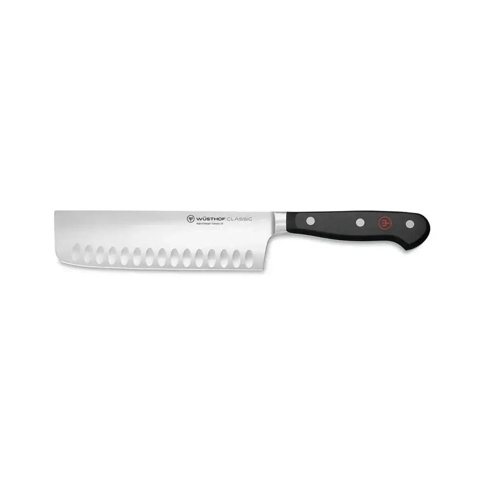 Serrated knife with black handle on a white background