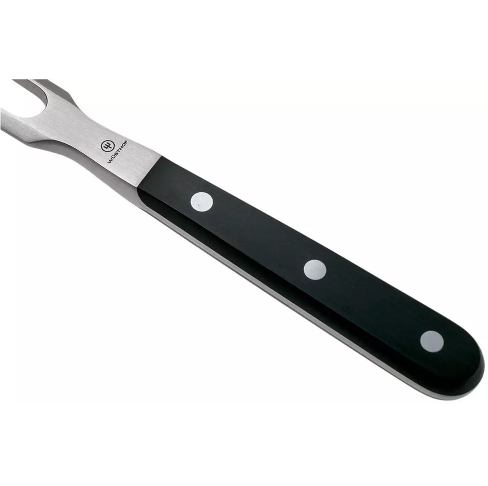 A wusthof carving fork with a stainless steel blade featuring a forked end and a black handle with three silver rivets, shown on a white background.