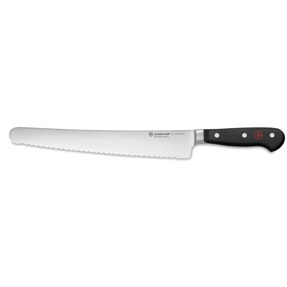 A Wusthof bread knife with a long silver serrated blade and a black handle, shown horizontally against a plain white background.