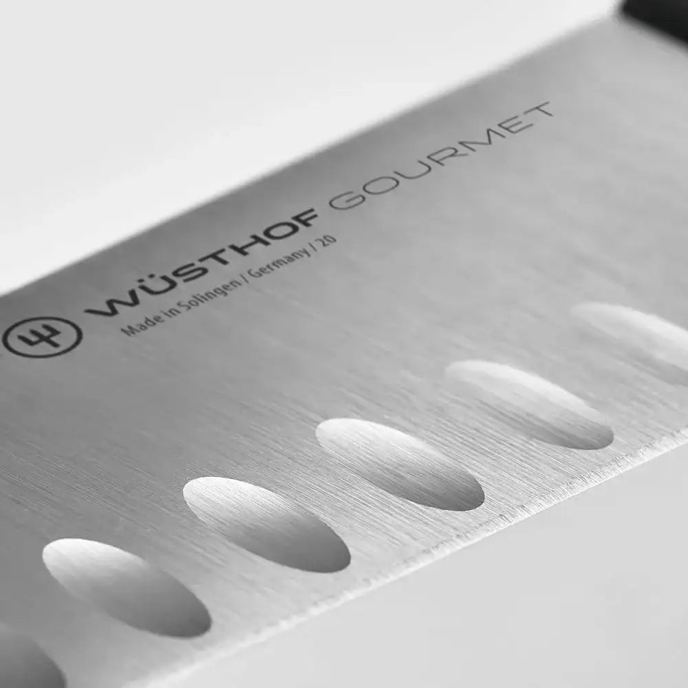 Wüsthof Gourmet knife blade with brand logo on a white background