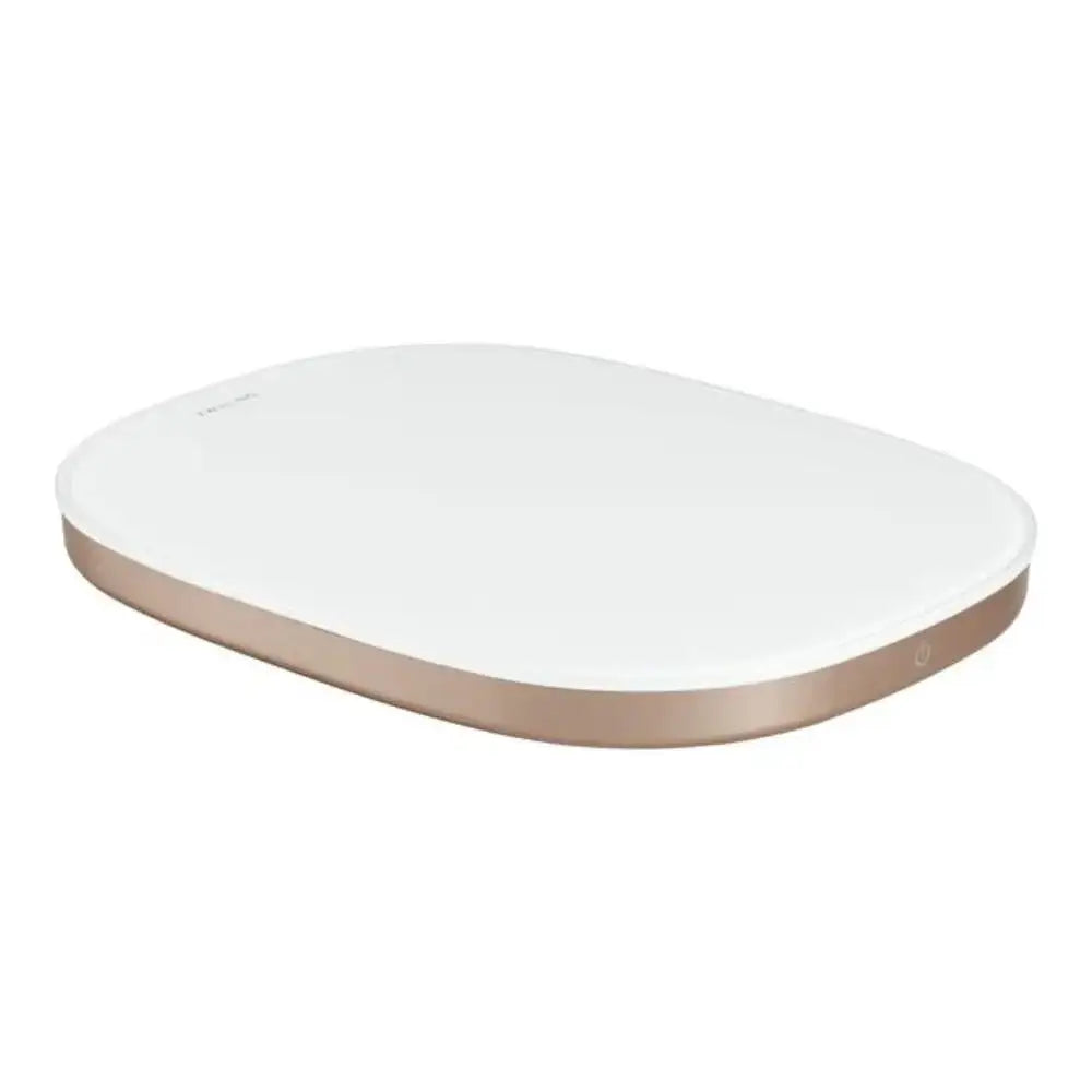 White digital scale with a metallic rim on a white background
