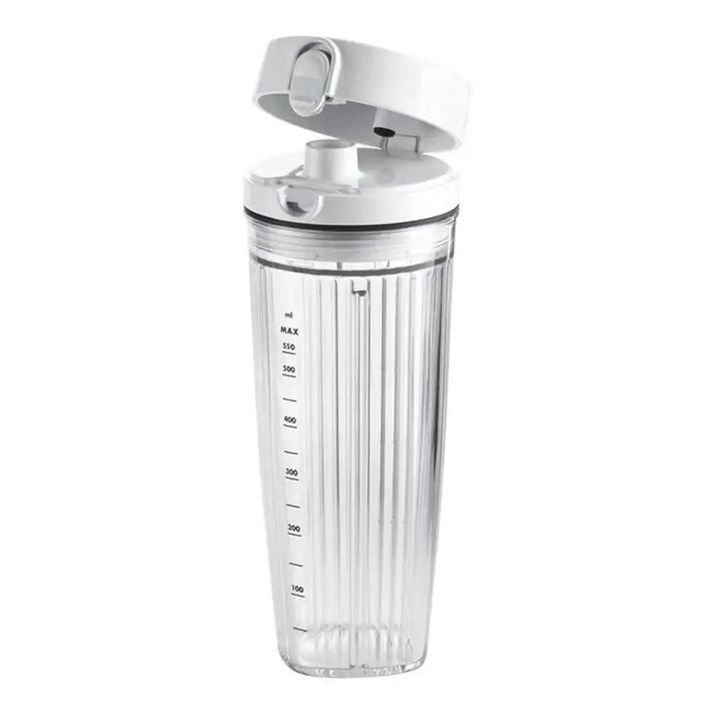 Clear blender container with white lid on a white background
