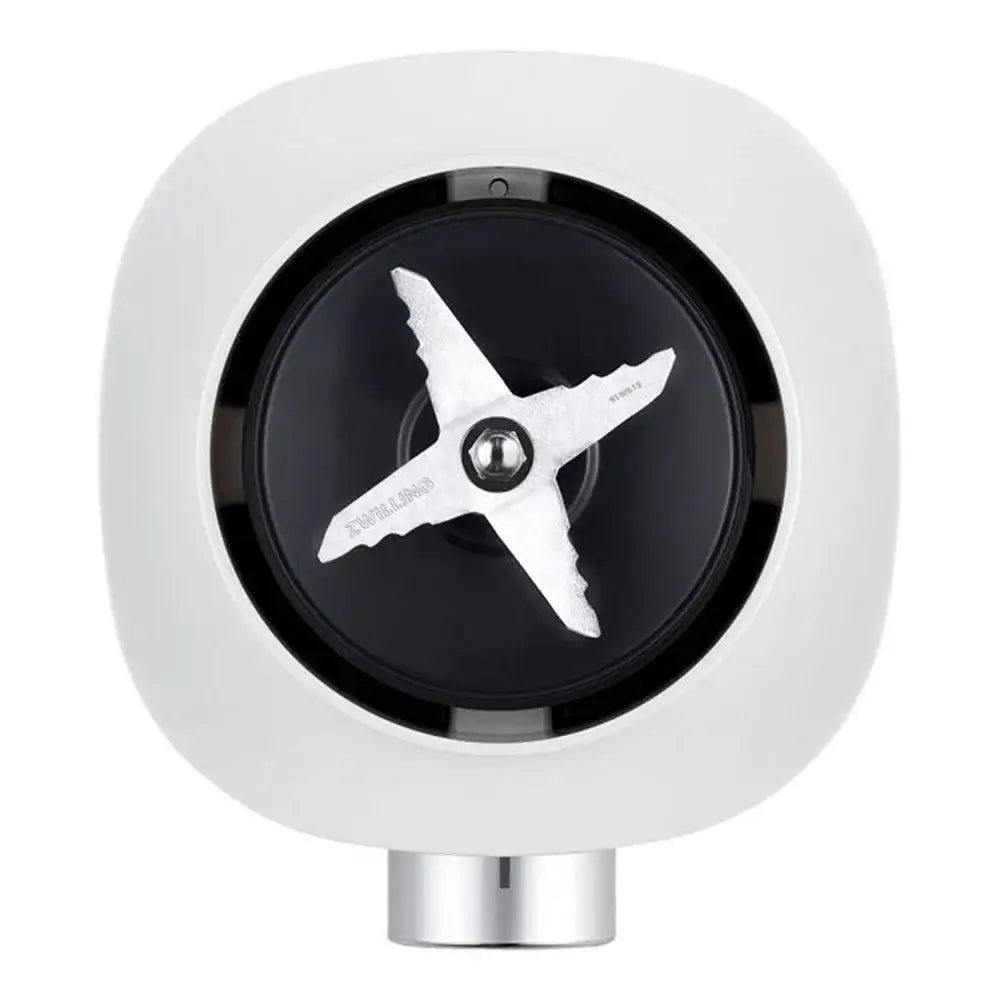 Blender blade with white star-shaped design on a black background, enclosed in a silver and white housing.