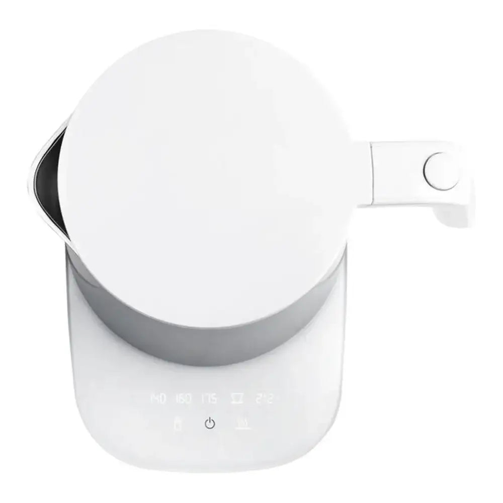 White electric kettle with control panel on a white background