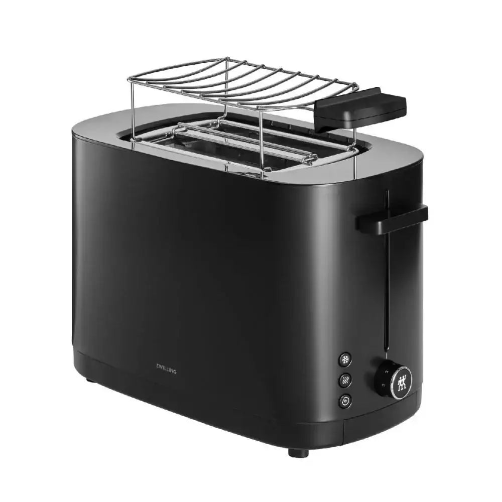 Black toaster with a clear bread basket on a white background