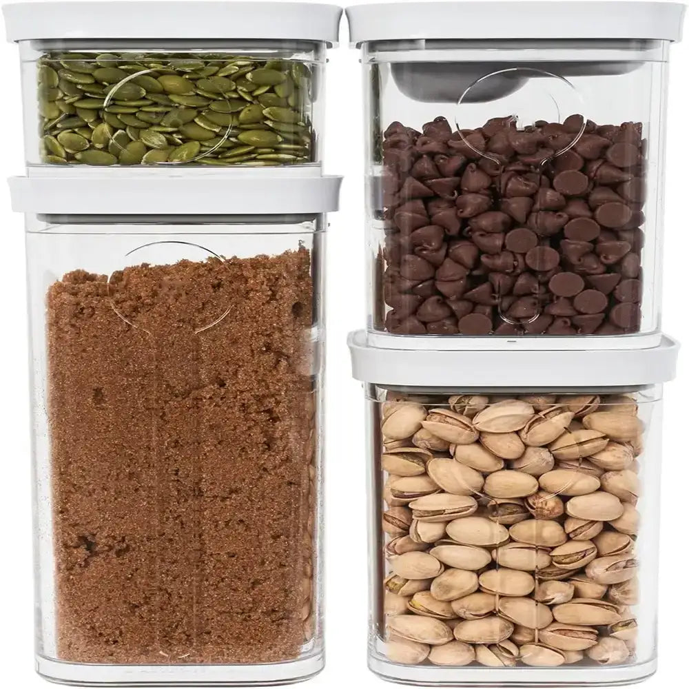Set of clear storage containers with lids, each filled with different food items.