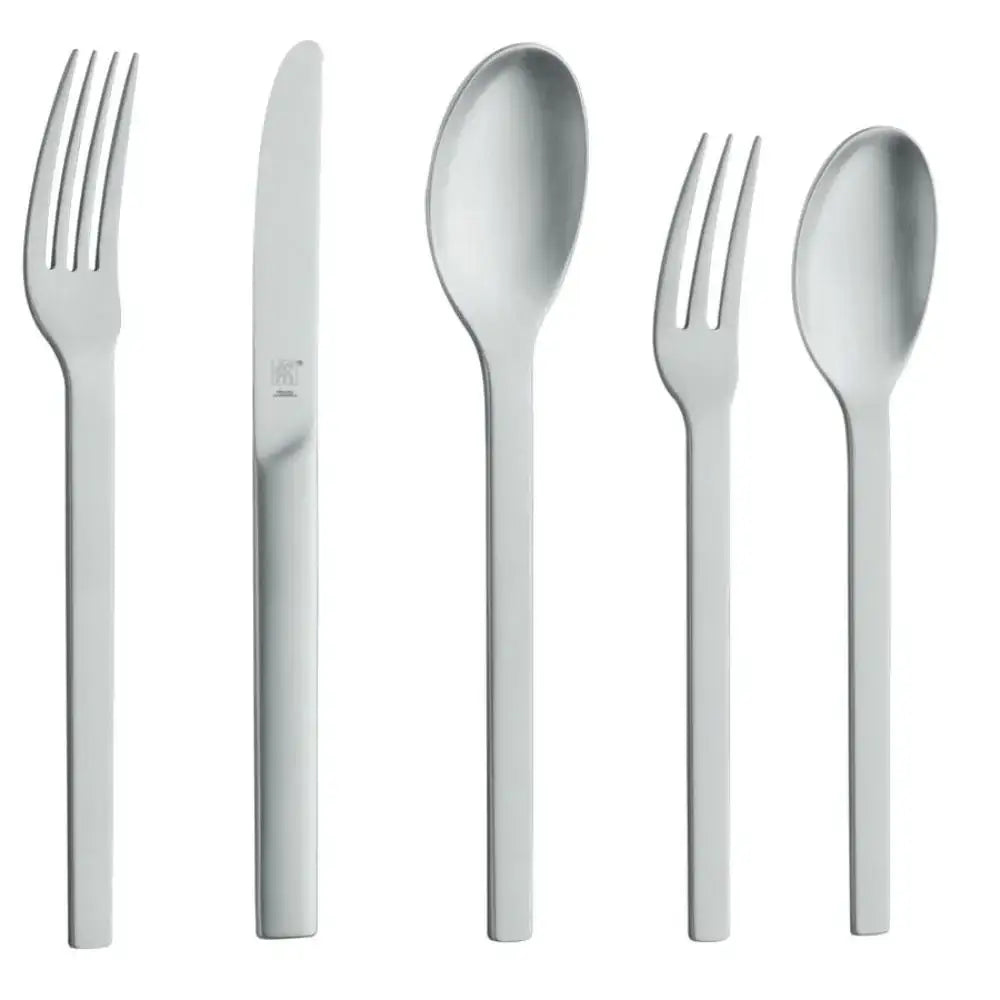 Set of silver cutlery including fork, knife, and spoons on a white background