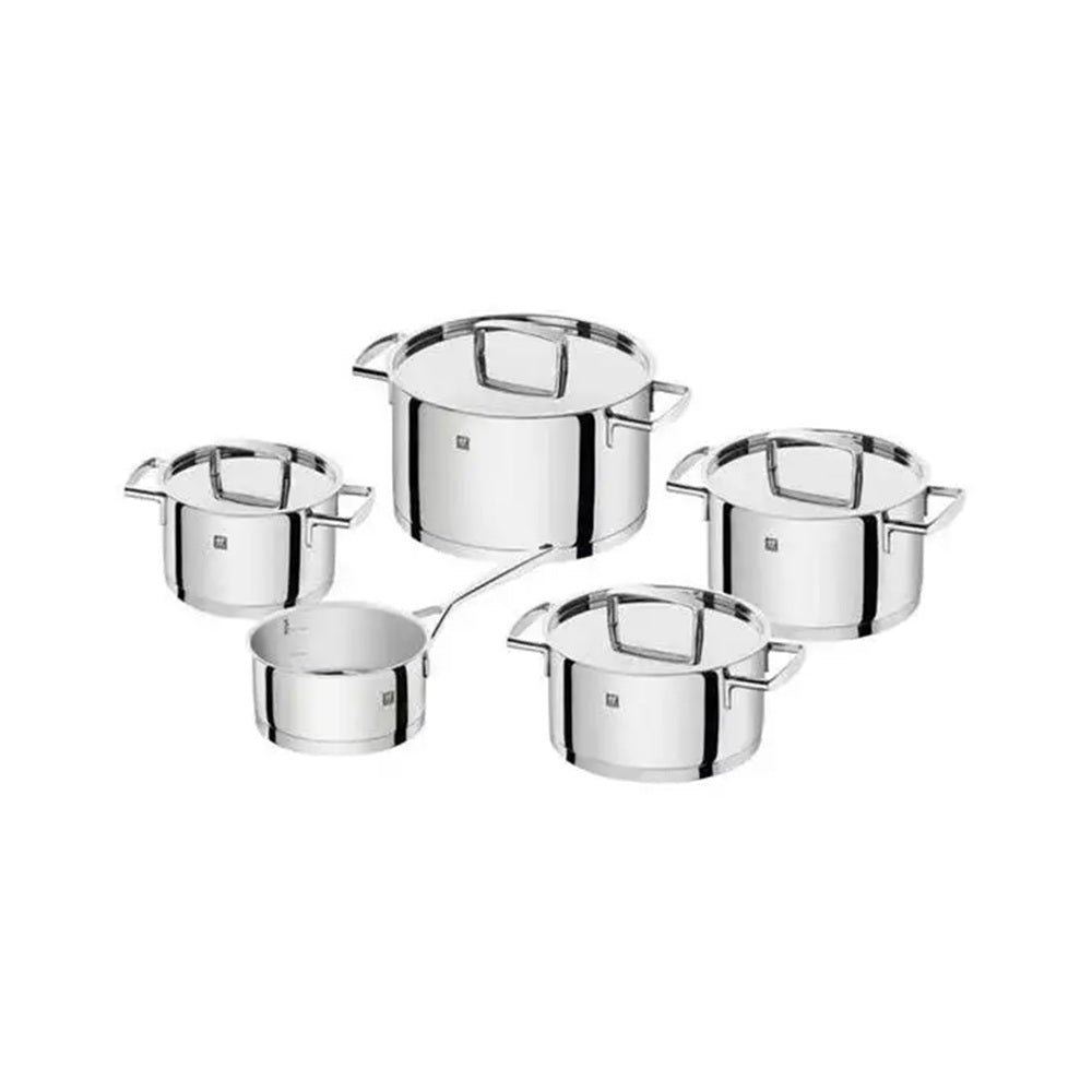 Set of stainless steel cookware on a white background