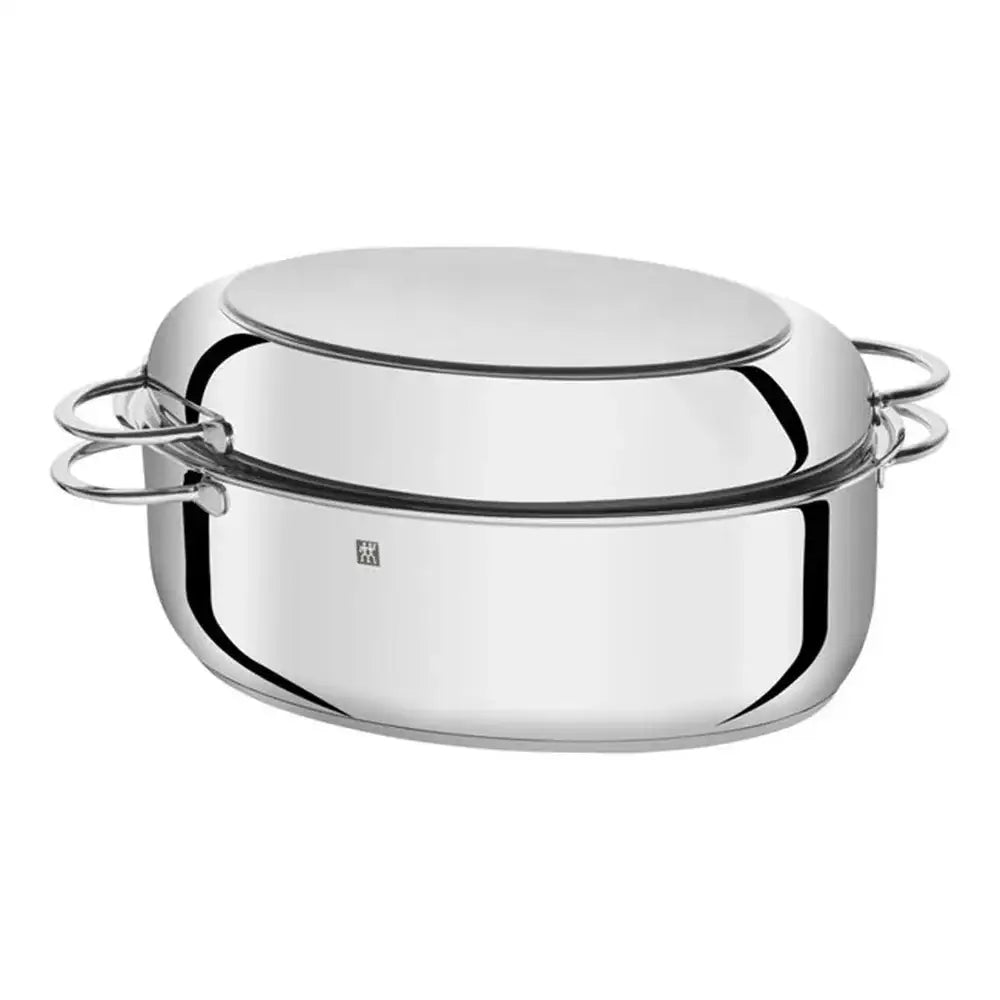 Stainless steel serving dish with lid on a white background