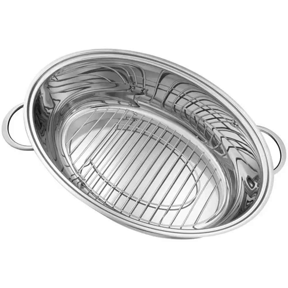 Stainless steel roasting pan with rack on a white background