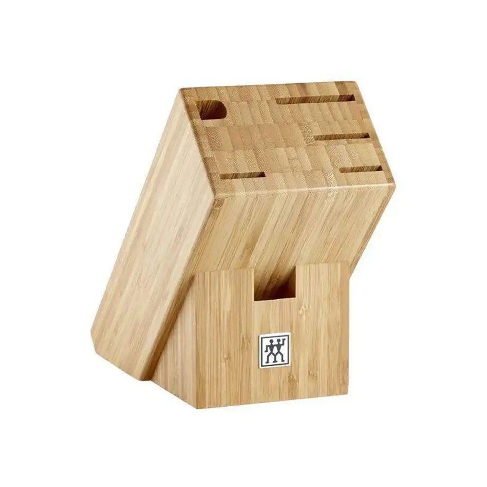 Wooden knife block with multiple slots on a white background