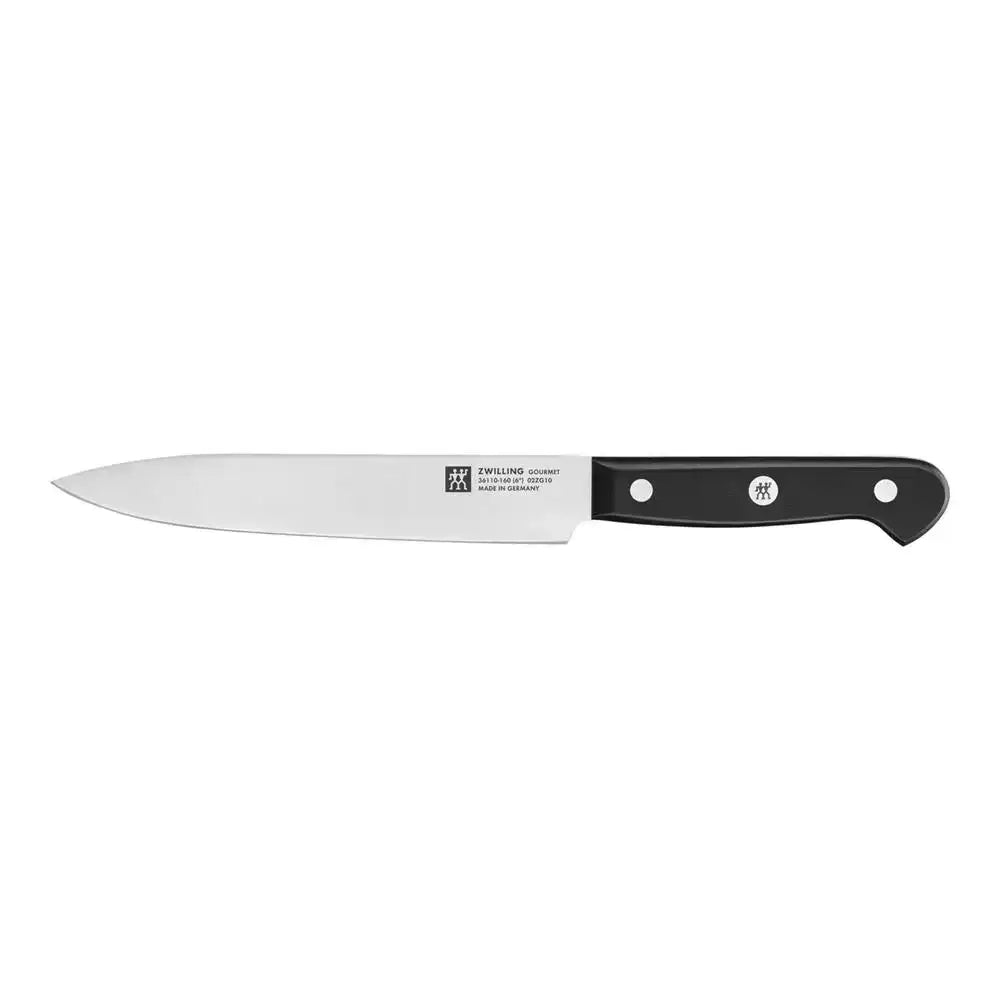 Chef's knife with black handle on a white background