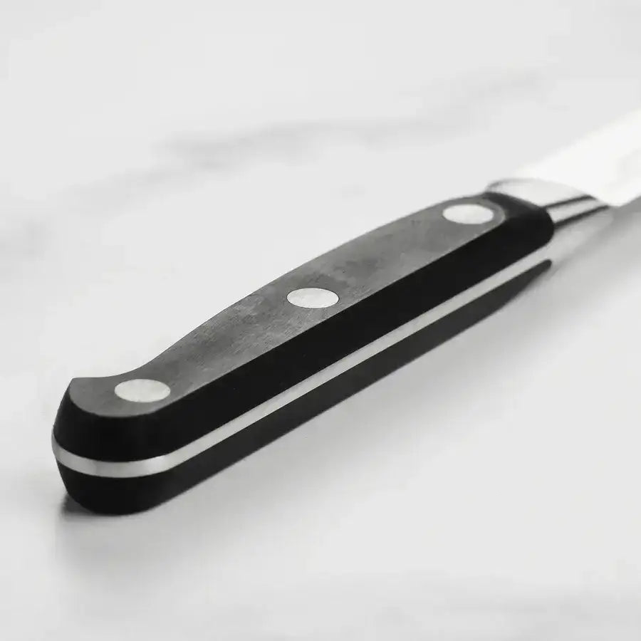 Knife handle with black and silver design on a white background