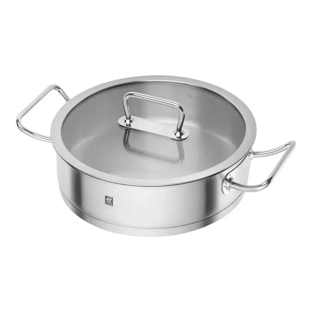 Stainless steel pot with lid on a white background