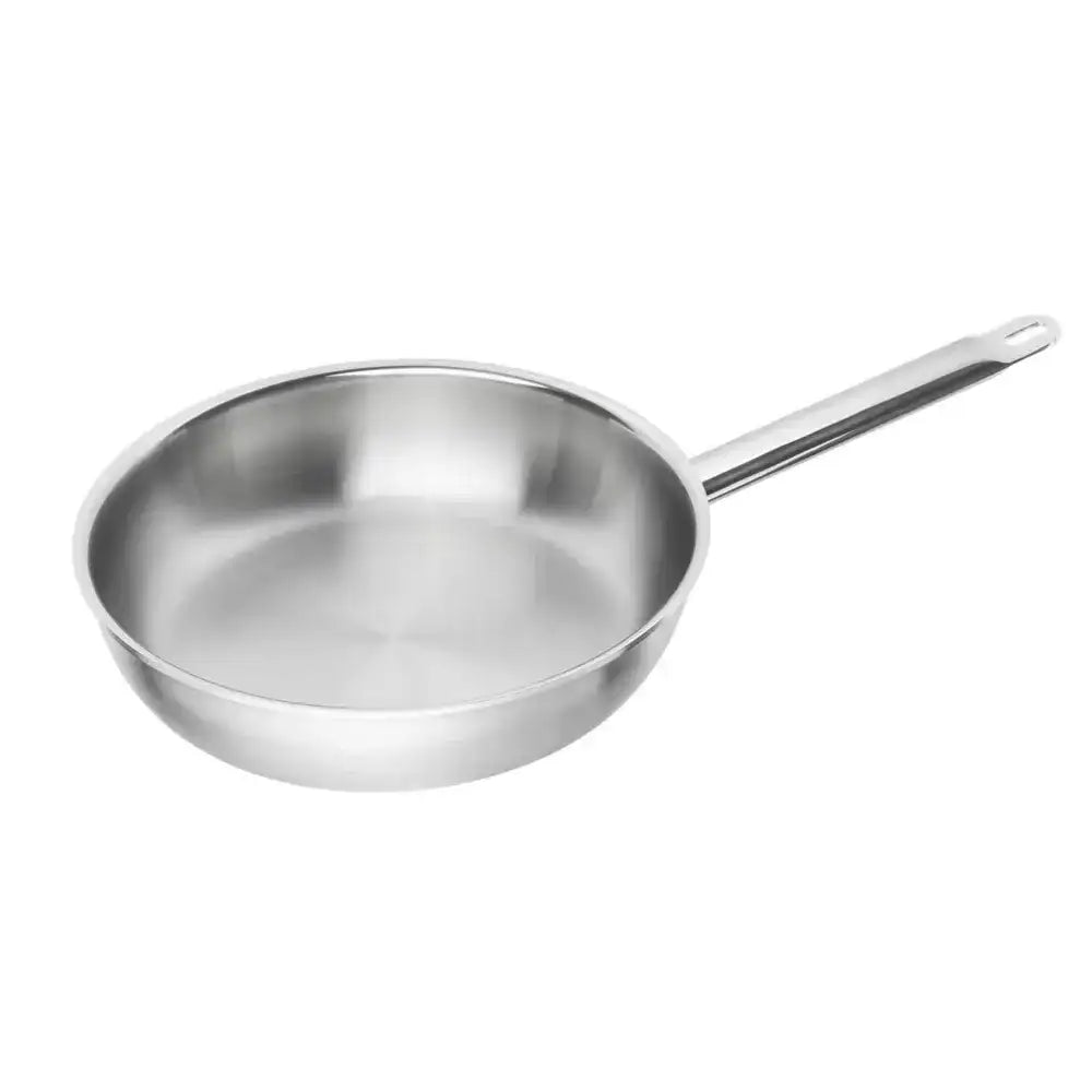 Stainless steel frying pan on a white background
