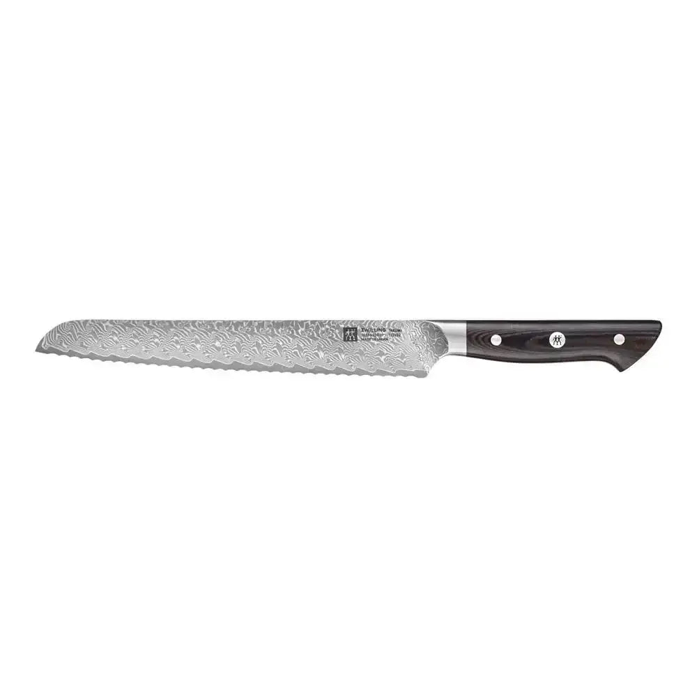 Bread knife with a textured blade and black handle on a white background