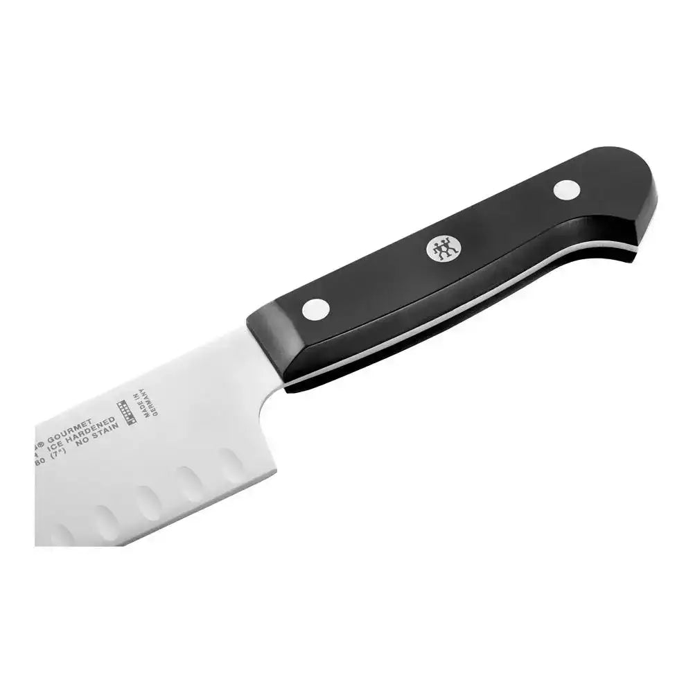 Knife with black handle and white blade on a white background