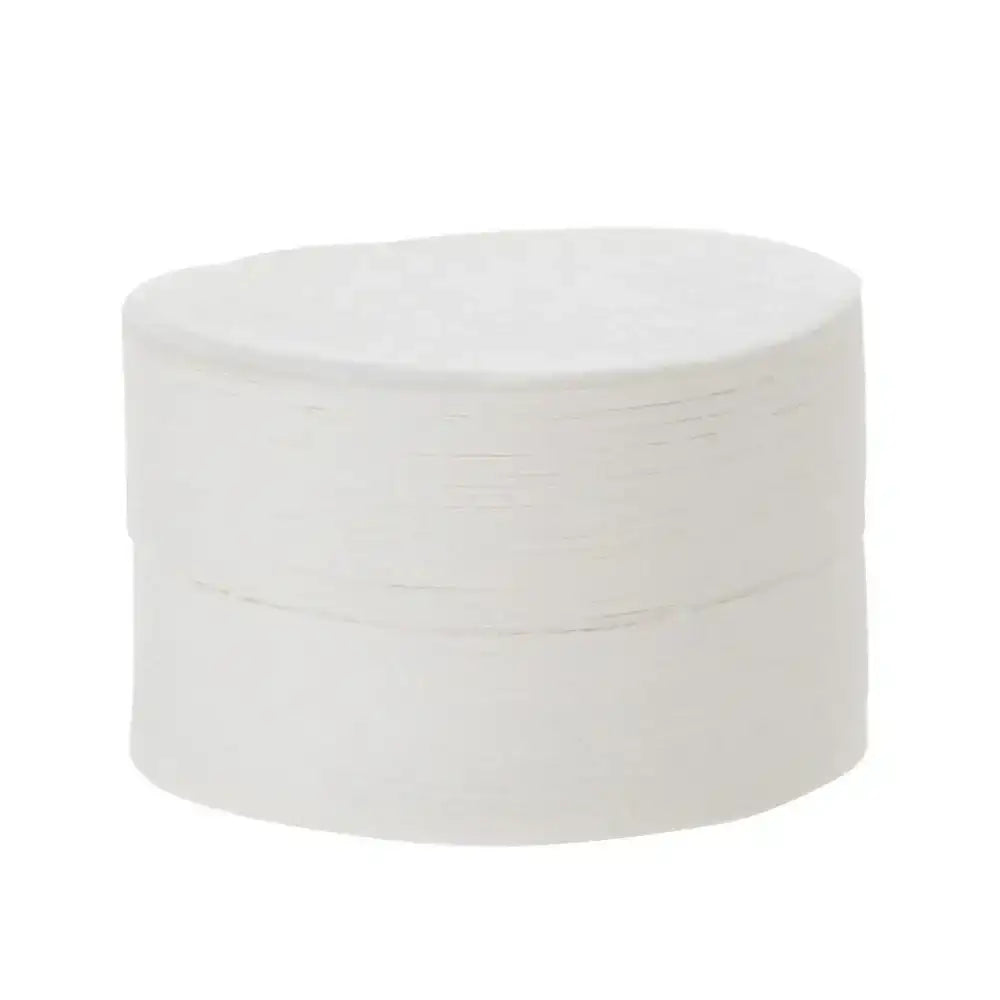 White round container with cotton pads on a white background