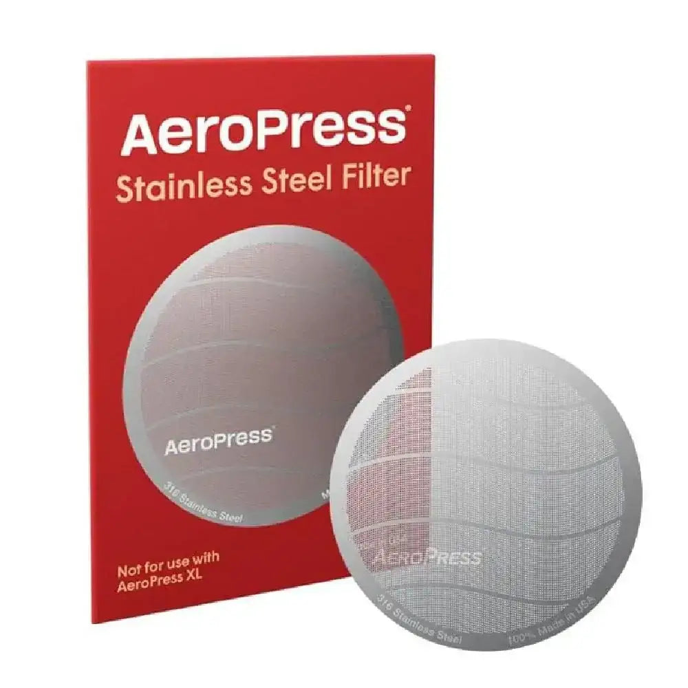 Aeropress stainless steel filter with packaging on a white background
