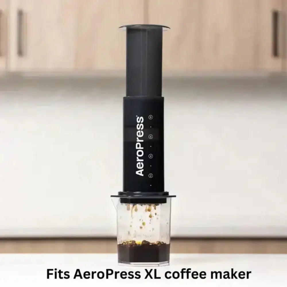 AeroPress XL coffee maker brewing in a kitchen on a counter, fits AeroPress XL filters