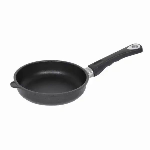 Non-stick black frying pan with ergonomic handle on white background, Cookin Stores kitchenware