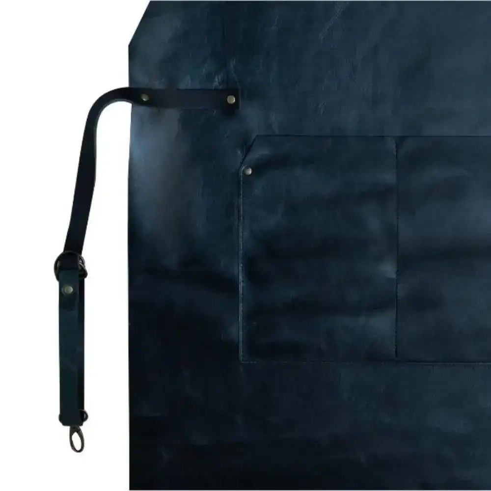 Dark blue full leather apron by Arrow Leather Goods with a single front pocket and adjustable strap