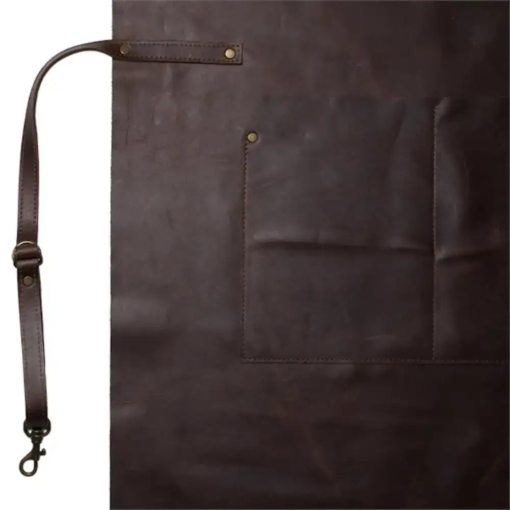 Brown leather apron with a strap on a white background