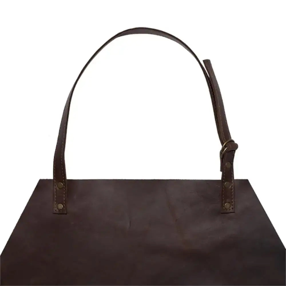 Brown leather apron with a neck strap on a white background