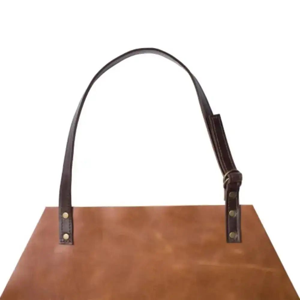 Adjustable neck strap for a Tan leather apron on a white background