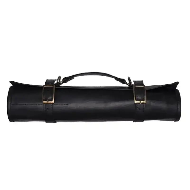 Black leather roll with gold buckles on a white background