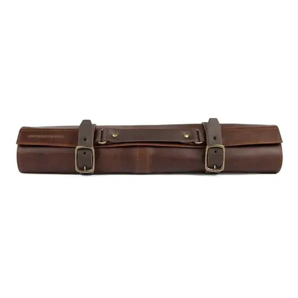 Brown leather roll with gold buckles on a white background