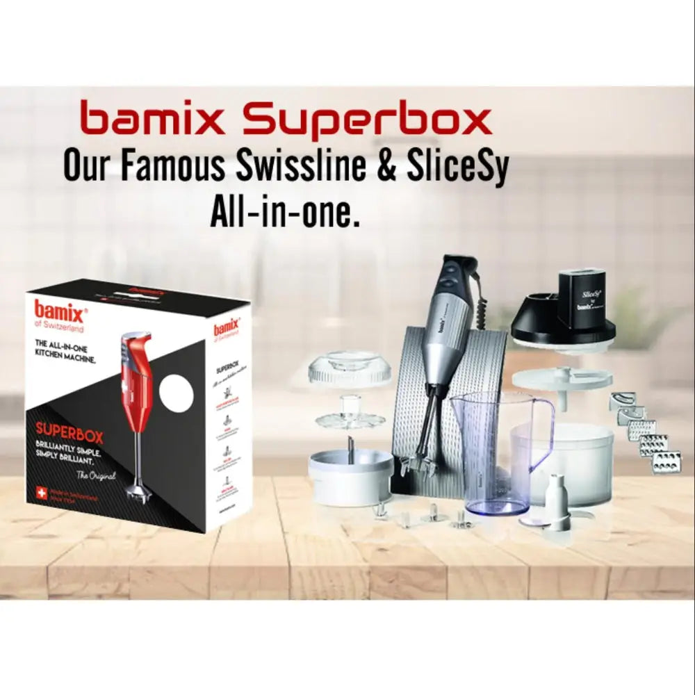 Bamix Superbox with kitchen appliances on a wooden surface