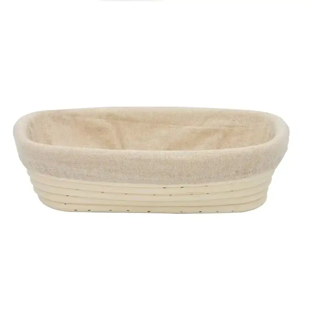 Round bread proofing basket made of natural woven material on a white background