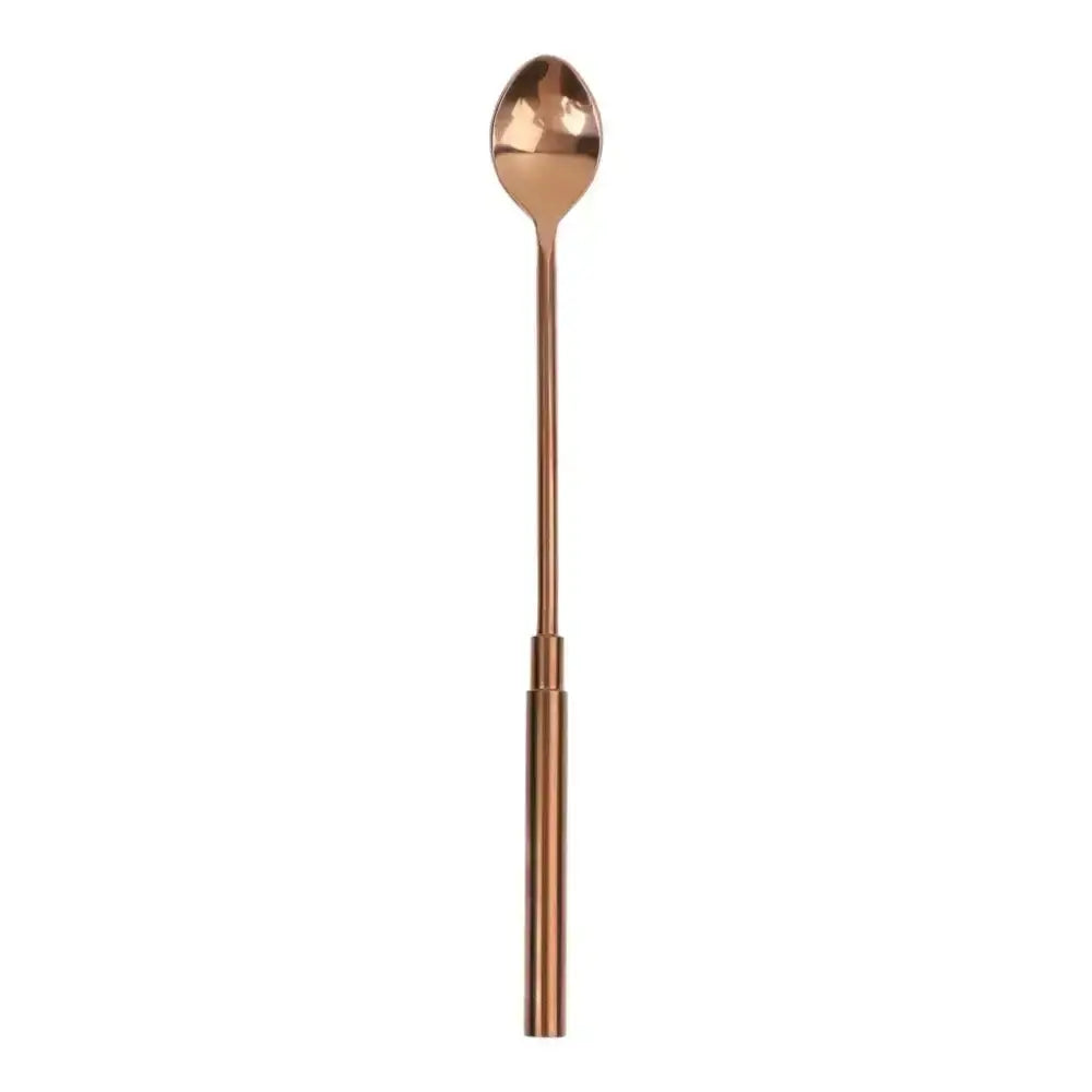 Copper-colored spoon on a white background