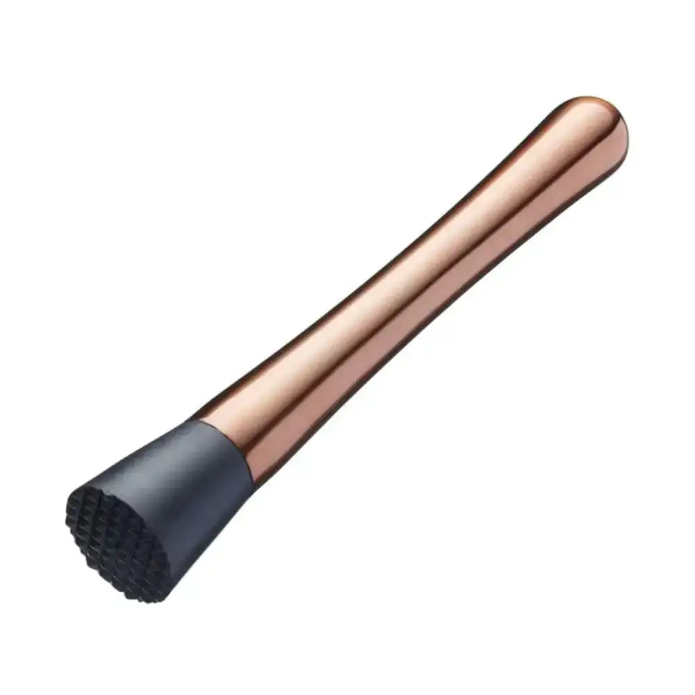 Copper and black cocktail muddler on a white background