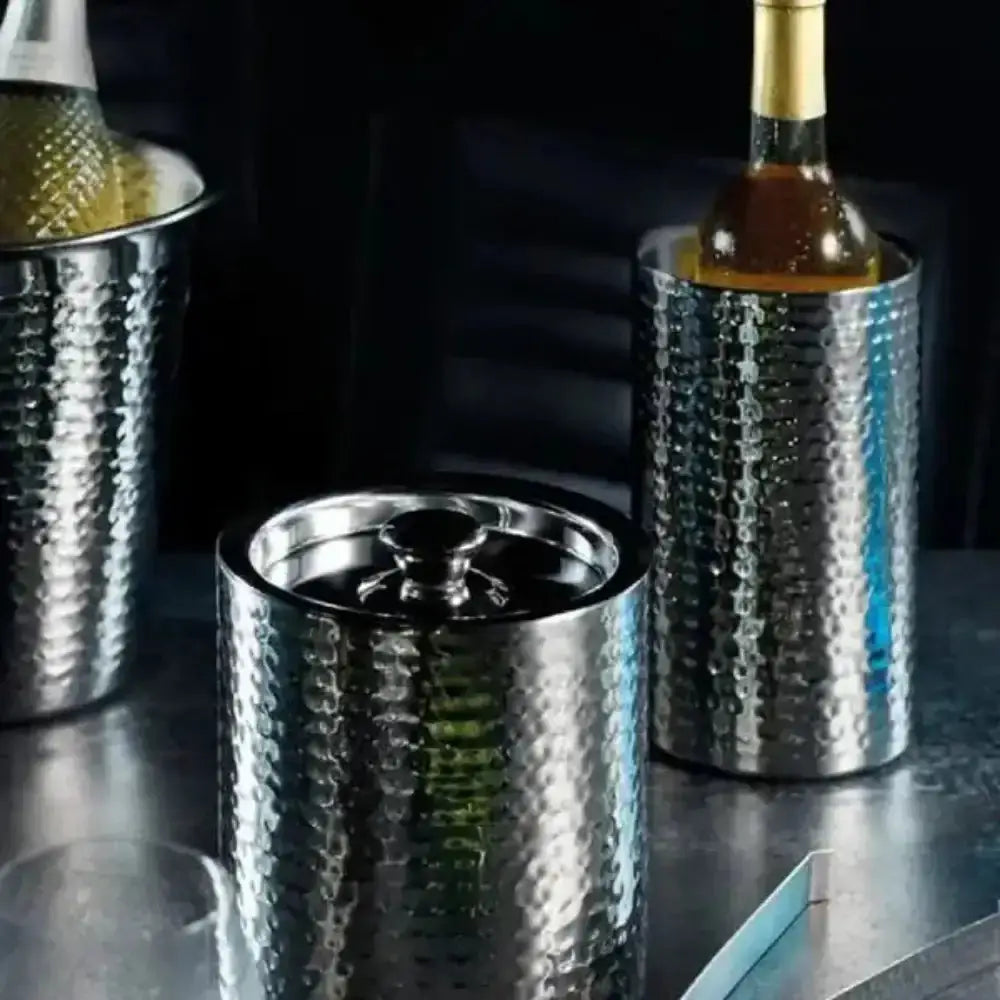 Hammered stainless steel wine cooler and ice bucket on countertop, Cookin Stores kitchenware.