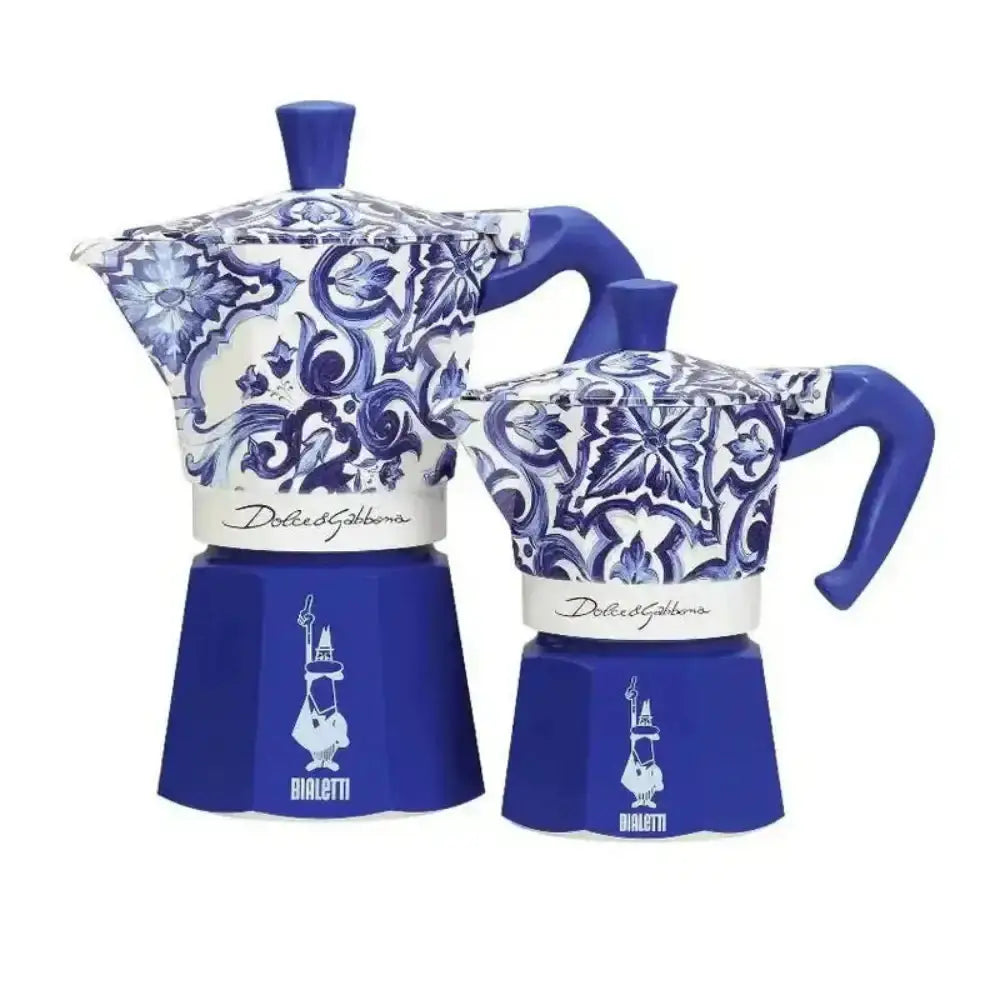 Two Bialetti moka pots with blue and white floral patterns on a white background