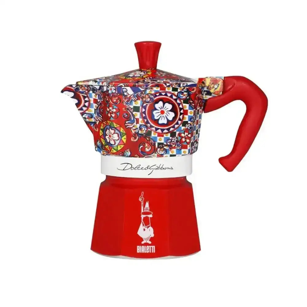 Red and multicolored patterned coffee maker with Bialetti logo on a white background