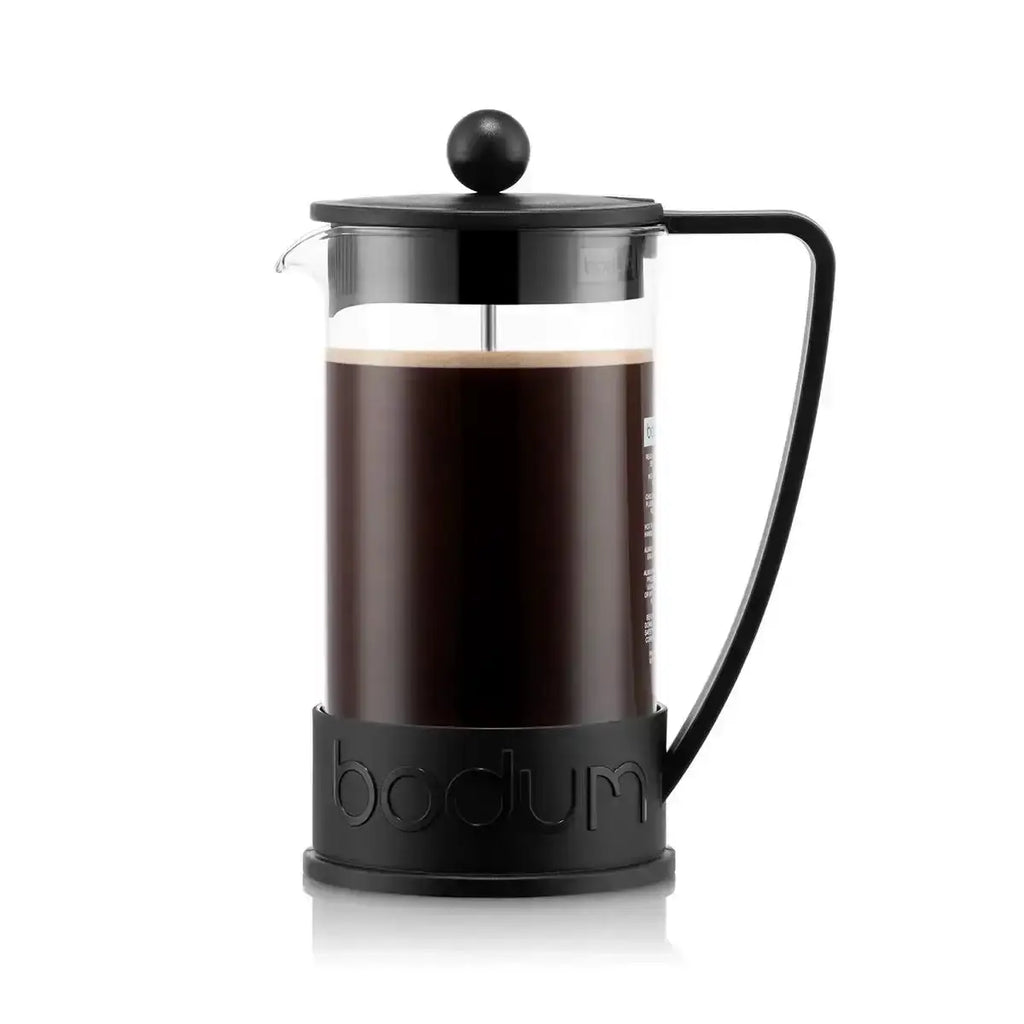 Bodum French press with coffee on a white background