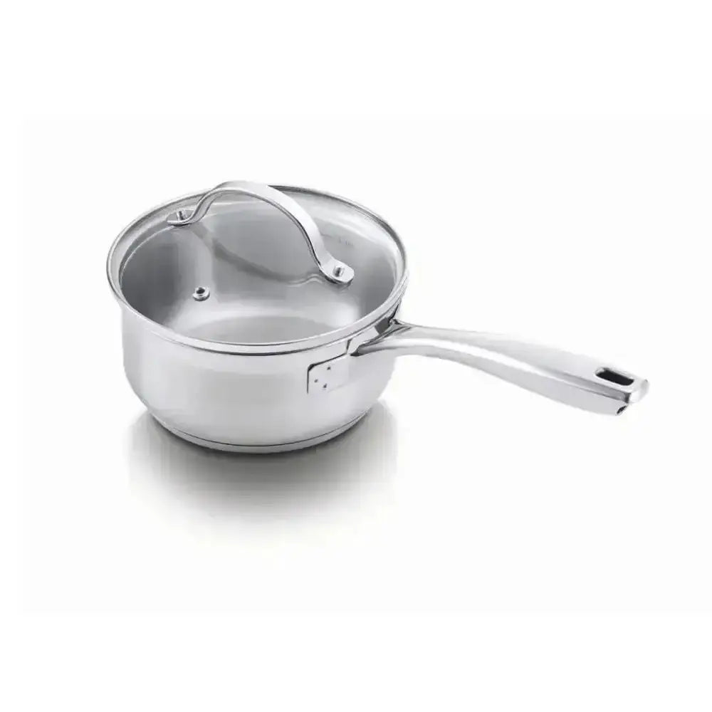 Stainless steel saucepan with lid on a white background