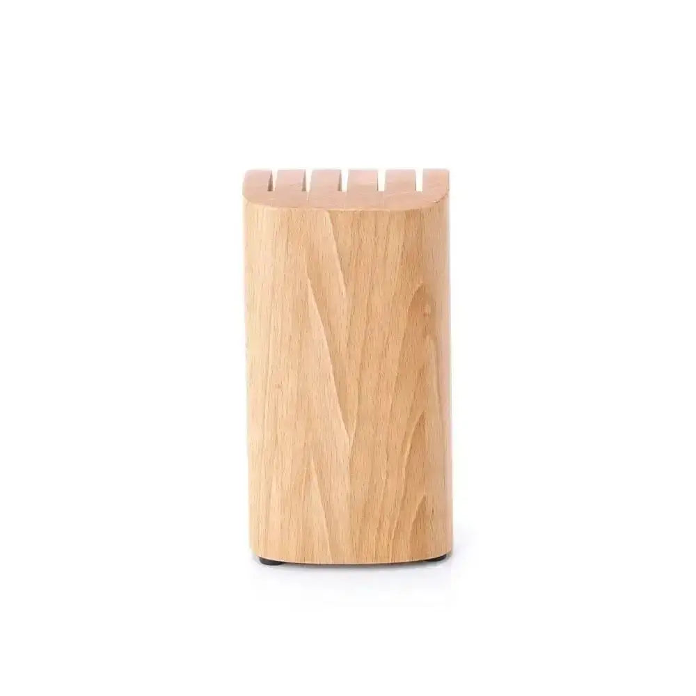 Wooden kitchen utensil holder with slots on a white background